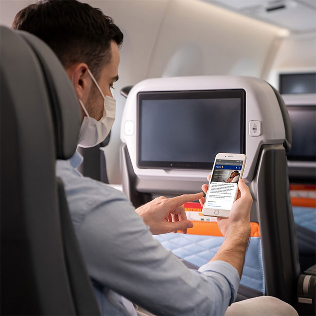 dung-wifi-tren-may-bay Vẫn có khoảng cách nhất định giữa Wi-Fi trên máy bay và mặt đất.
